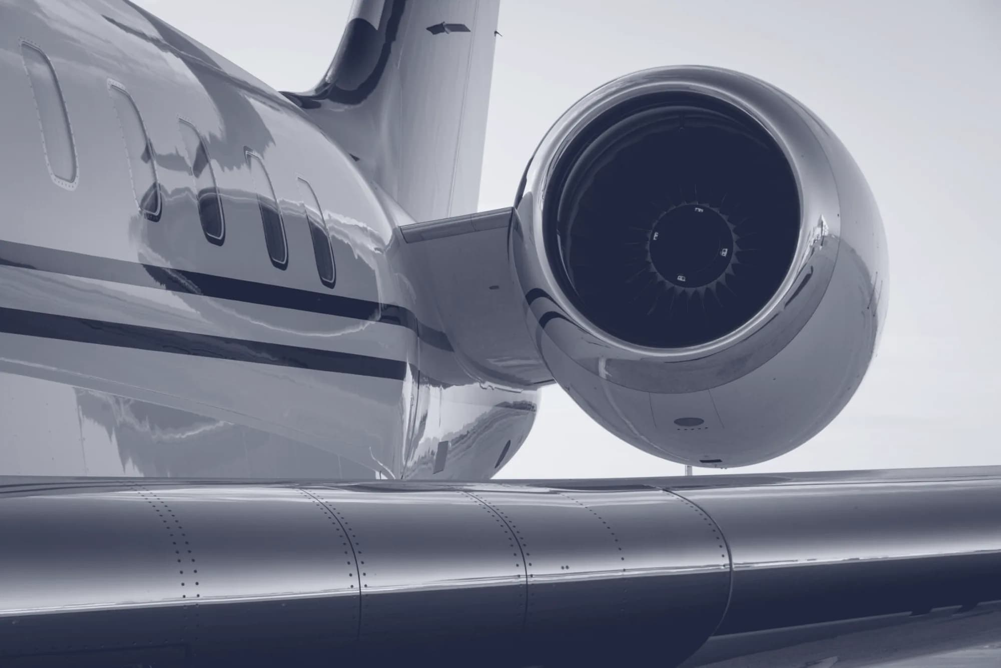 Business jet fuselage, wing, and engine nacelle in close detail