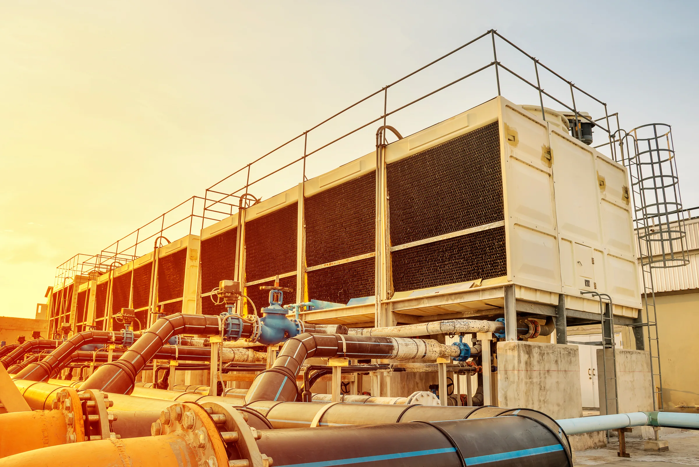 Rooftop cooling towers on a data center building — cooling and power infrastructure financing