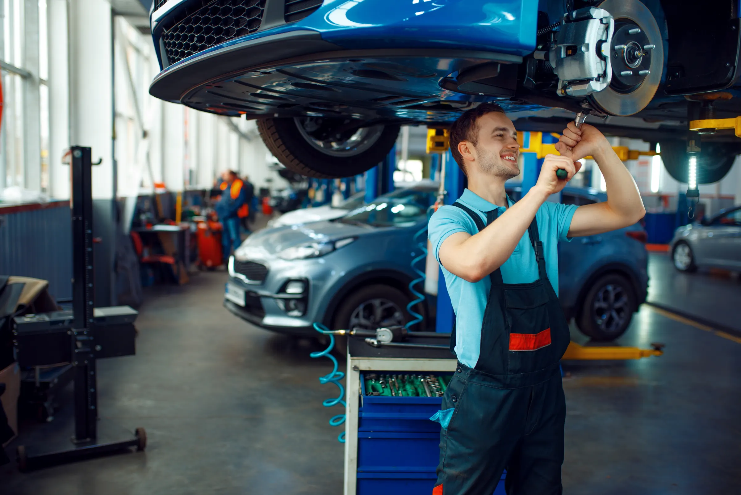 Auto repair shop bays with vehicle lifts and diagnostics — auto shop equipment financing