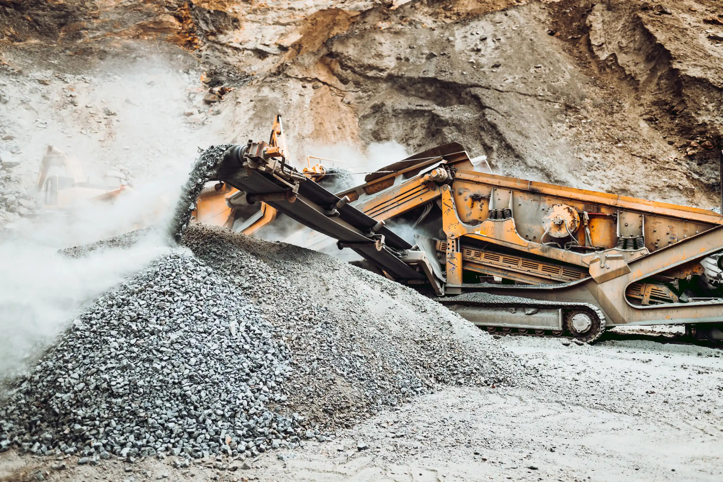Crusher plant and haul truck in an aggregate quarry — mining equipment financing
