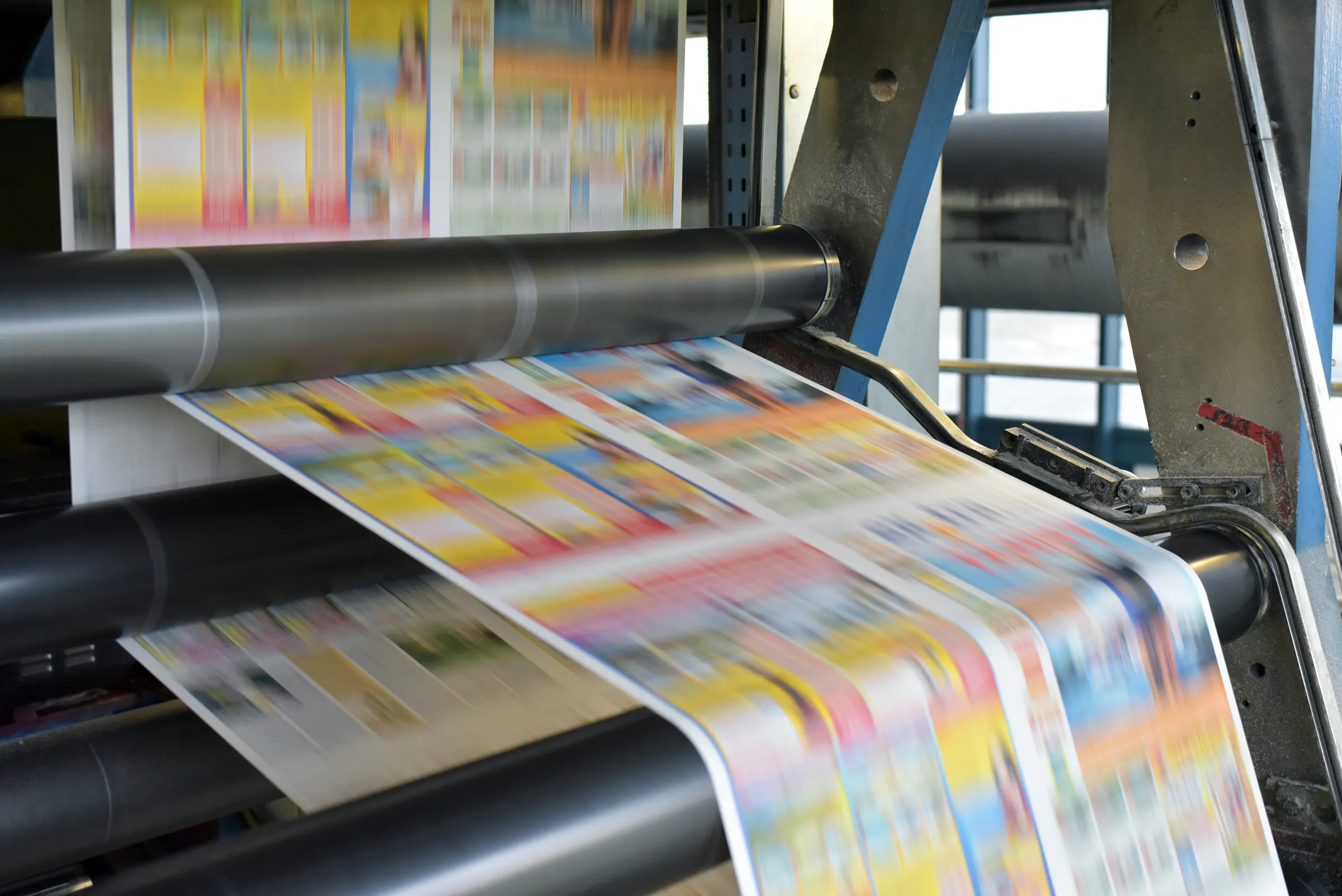 Digital production press running on a print floor — printing equipment financing