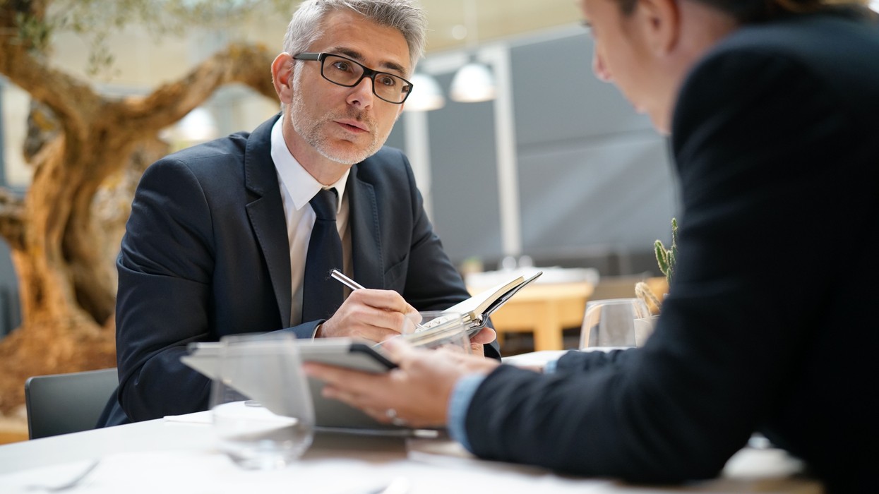 Two business professionals in a meeting.